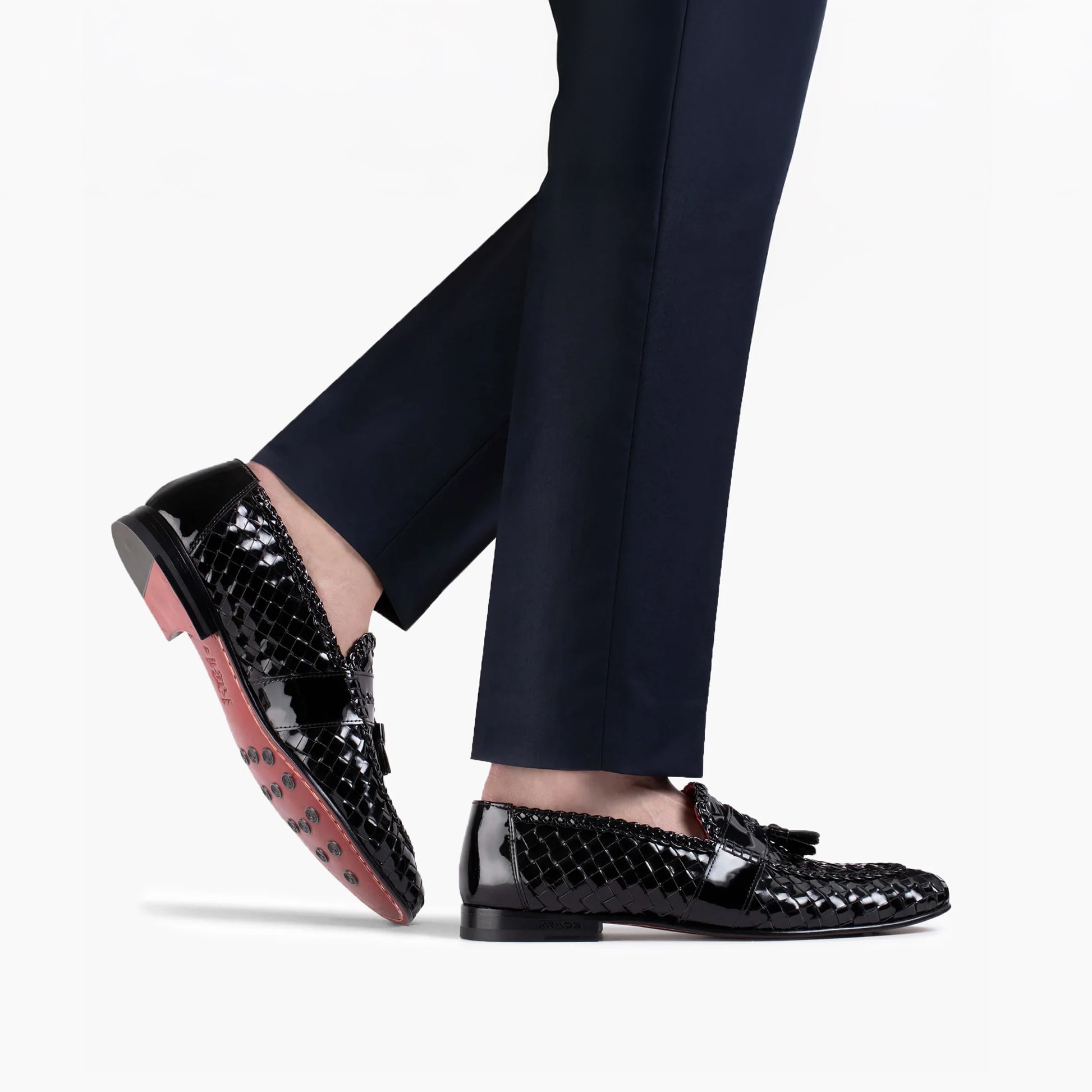 Плетеные лоферы с кисточкой