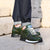 Темно-зеленые Кроссовки с белой шнуровкой